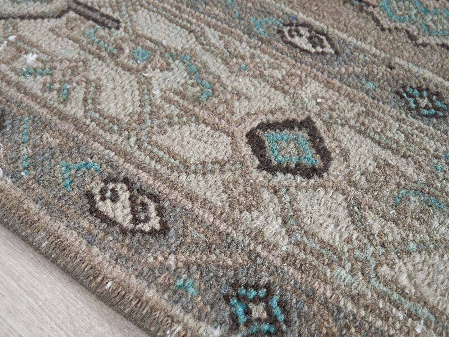  Infuse vintage elegance into your hallway! Our vintage Persian traditional runner rug boasts earthy tones, including browns, taupes, teal, and petrol blue, adorned with a tribal and Aztec diamond motif design. Hand-knotted and uniquely vintage, this antique rug adds timeless sophistication to your home, inspired by design styles reminiscent of Studio McGee and Amber Interiors.