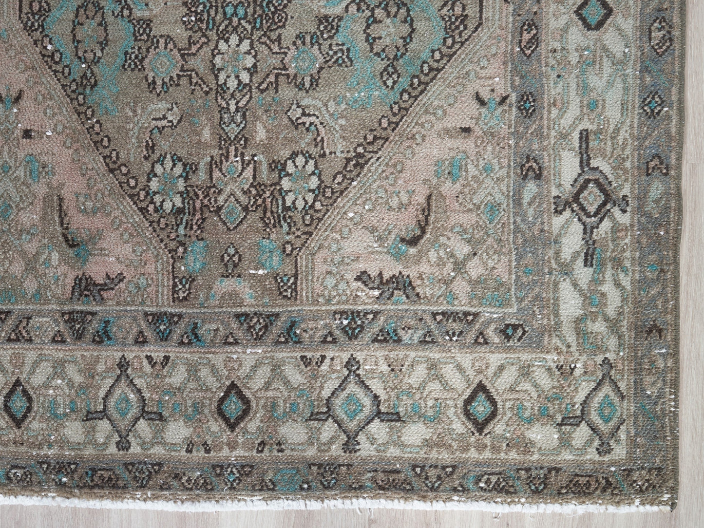  Infuse vintage elegance into your hallway! Our vintage Persian traditional runner rug boasts earthy tones, including browns, taupes, teal, and petrol blue, adorned with a tribal and Aztec diamond motif design. Hand-knotted and uniquely vintage, this antique rug adds timeless sophistication to your home, inspired by design styles reminiscent of Studio McGee and Amber Interiors.
