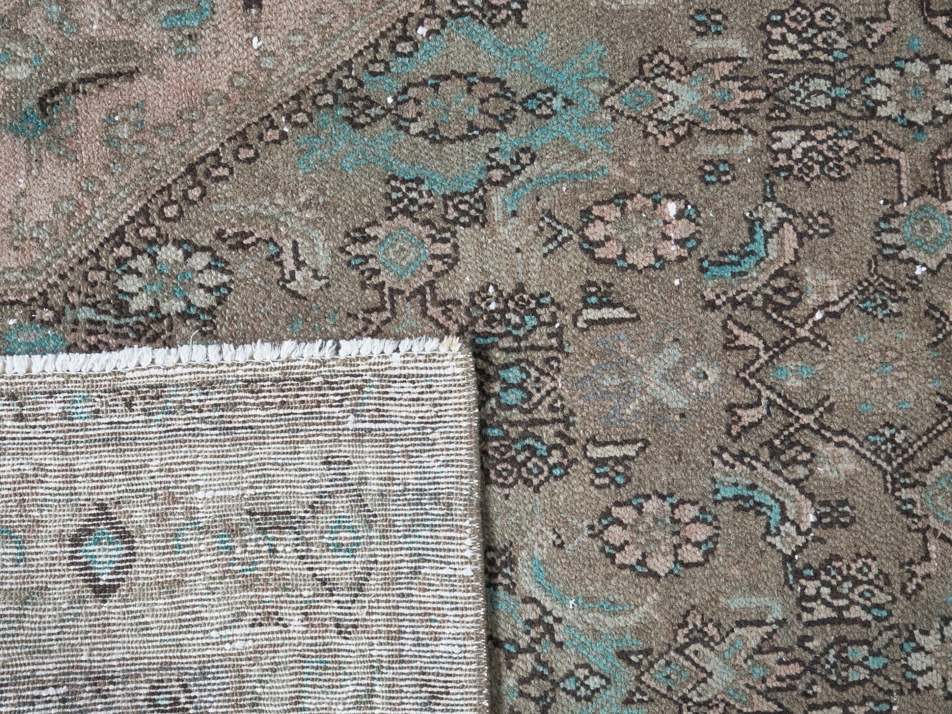  Infuse vintage elegance into your hallway! Our vintage Persian traditional runner rug boasts earthy tones, including browns, taupes, teal, and petrol blue, adorned with a tribal and Aztec diamond motif design. Hand-knotted and uniquely vintage, this antique rug adds timeless sophistication to your home, inspired by design styles reminiscent of Studio McGee and Amber Interiors.